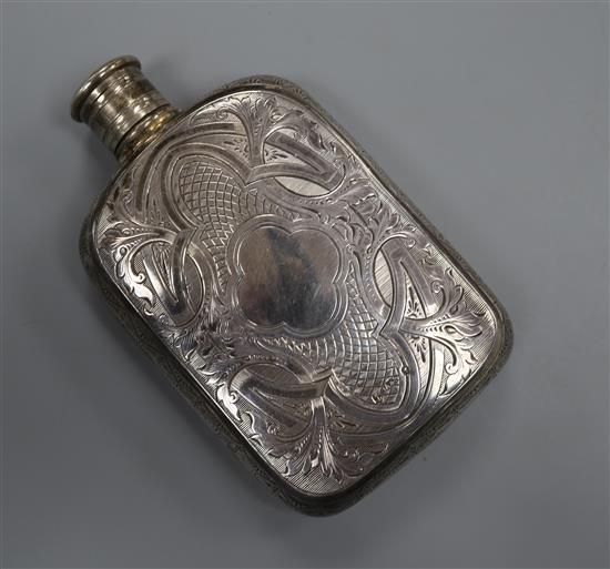 A Victorian engraved silver hip flask, Aston & Son, Birmingham, 1857, 12.9cm.